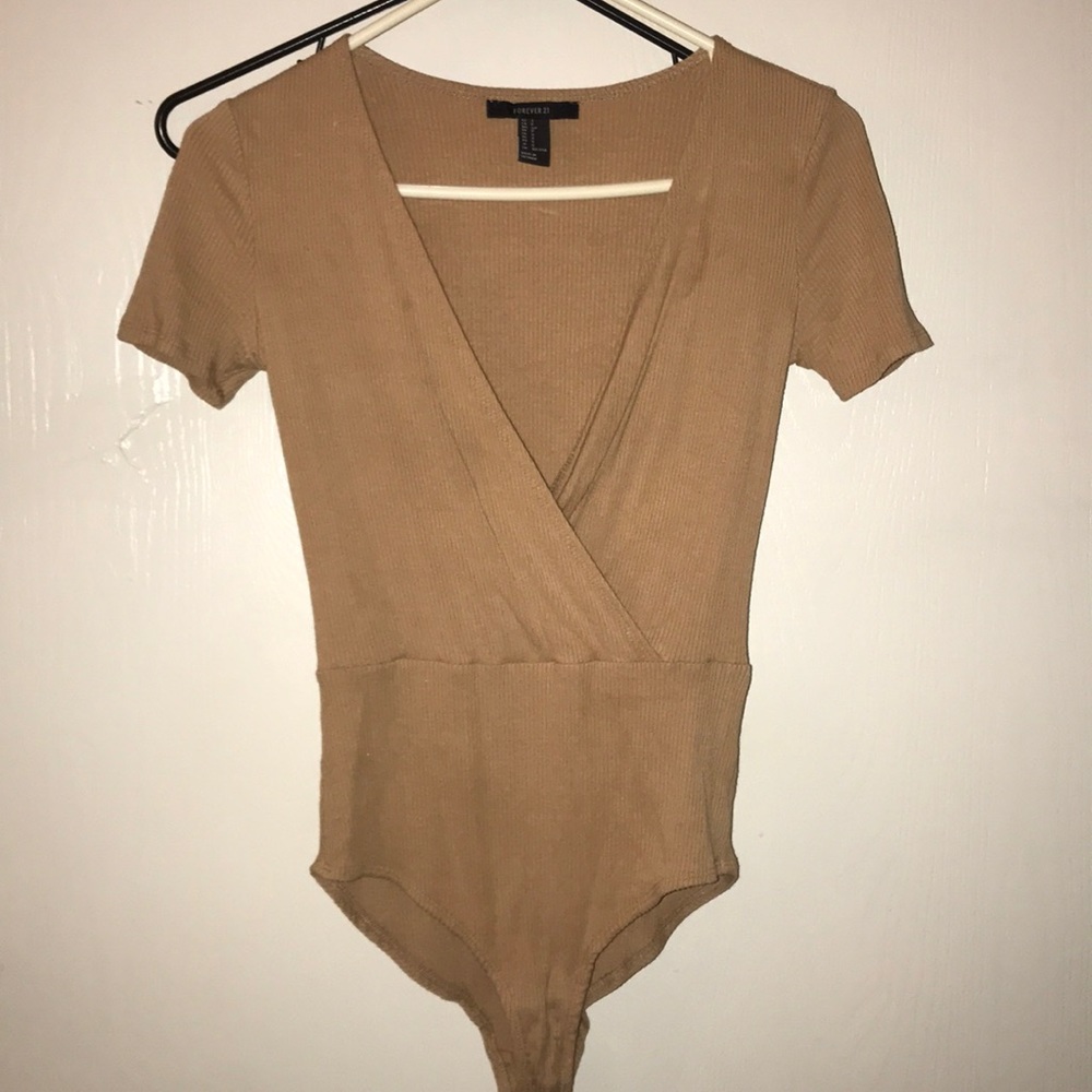 Tan one piece , perfect condition